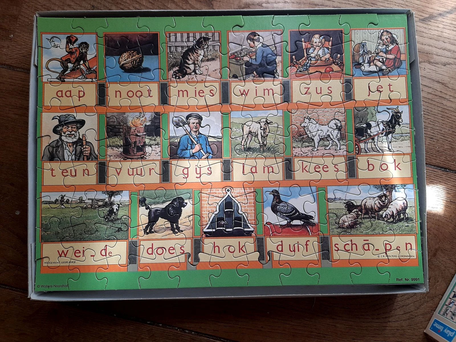 Aap noot mies ( leesplankje) puzzel 99 stukjes